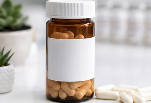 Custom compounded capsules and pharmacy bottle